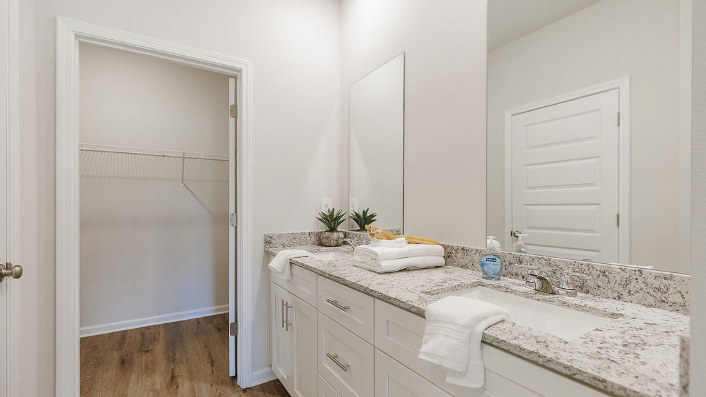 a 4-bedroom, 2.5-bathroom two-story home with over 2200 Sq. Ft. and a two-car garage