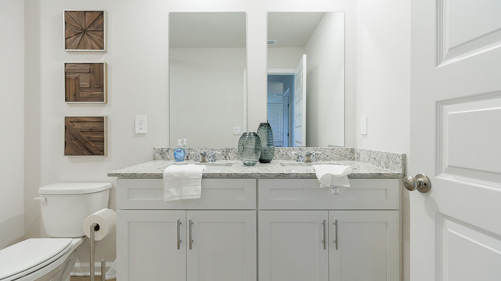 a 4-bedroom, 2.5-bathroom two-story home with over 2200 Sq. Ft. and a two-car garage