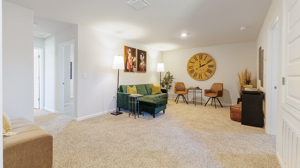 The Belfort is a 4-bedroom, 2.5-bathroom two-story home with over 2200 Sq. Ft. and a two-car garage