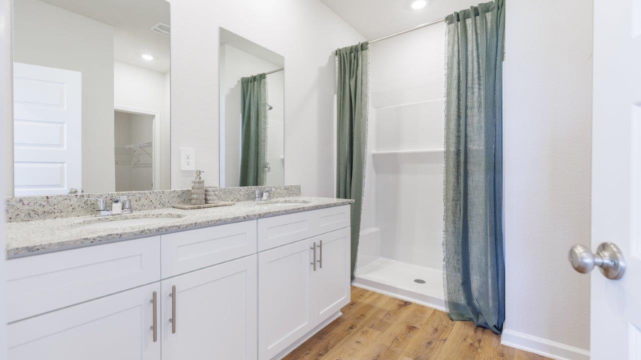 The one-level Beau plan is a spacious, 4-bedroom, 2 bath design in 1,799 square feet with 9-foot ceilings