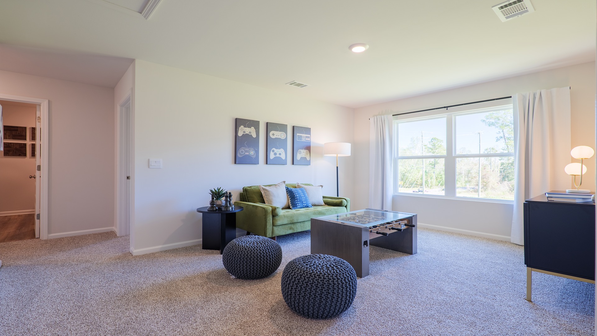 The Carol is a two-story home with 5 bedrooms, 3 bathrooms, and a two-car garage