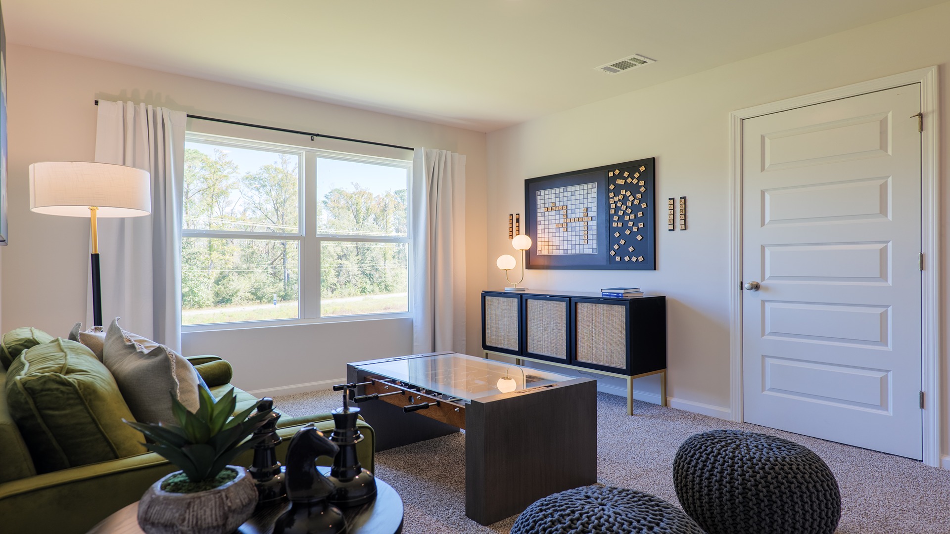 The Carol is a two-story home with 5 bedrooms, 3 bathrooms, and a two-car garage