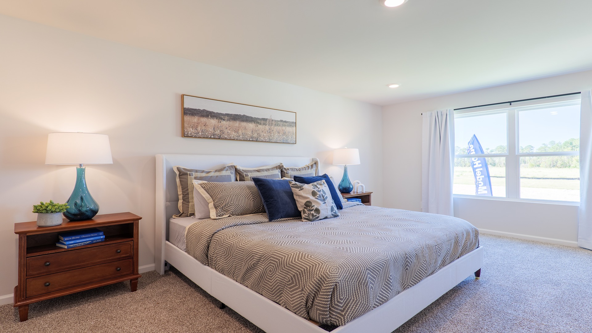 The Carol is a two-story home with 5 bedrooms, 3 bathrooms, and a two-car garage