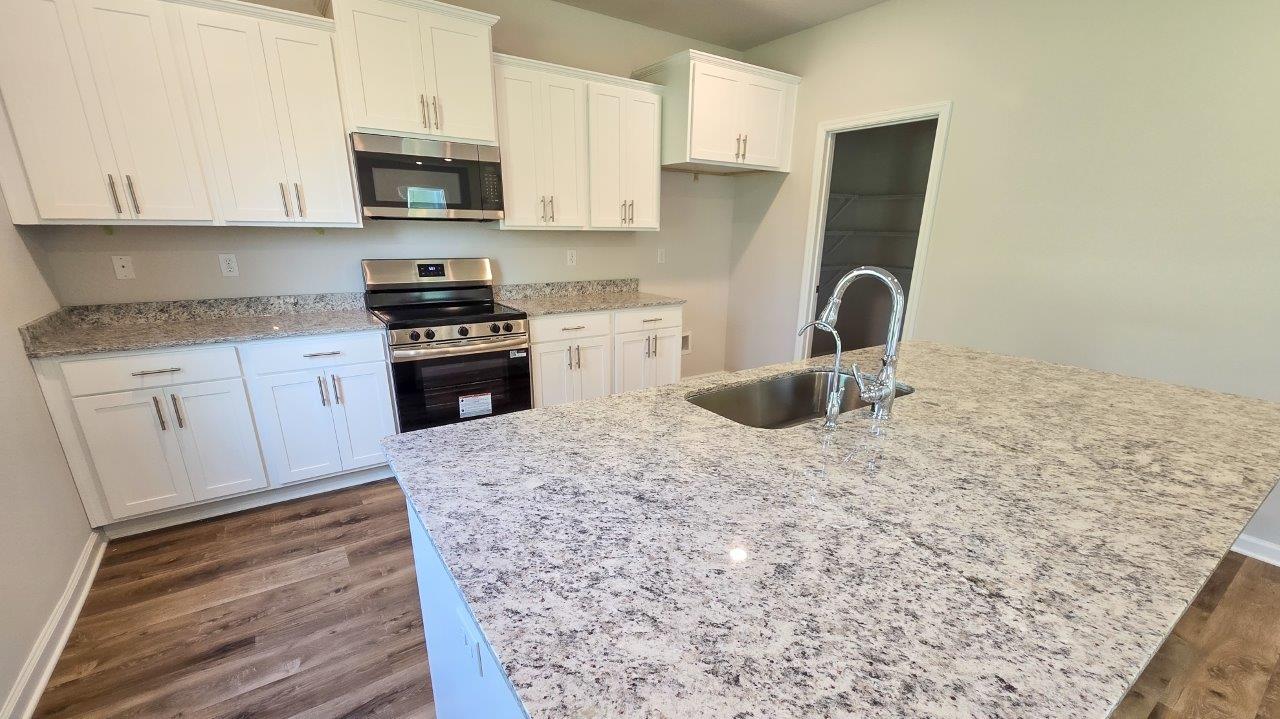 The Ryleigh is a two-story, single-family home with 2,416 square feet