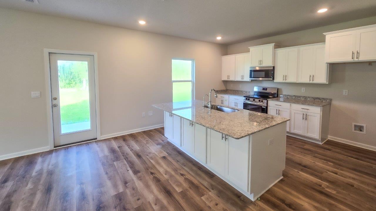 The Ryleigh is a thoughtfully crafted two-story single-family home offers 2,416 square feet