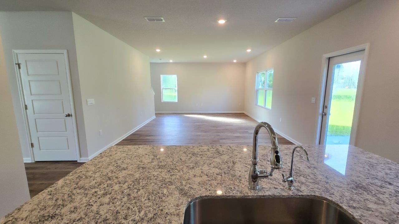 This thoughtfully crafted two-story single-family home offers 2,416 square feet of comfortable, modern living with 4 bedrooms, 2.5 bathrooms