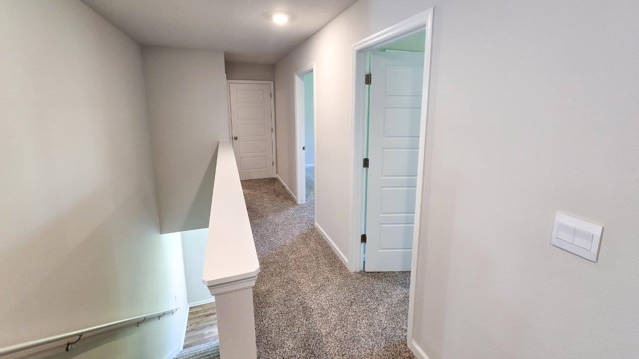 This thoughtfully crafted two-story single-family home offers 2,416 square feet of comfortable, modern living with 4 bedrooms, 2.5 bathrooms