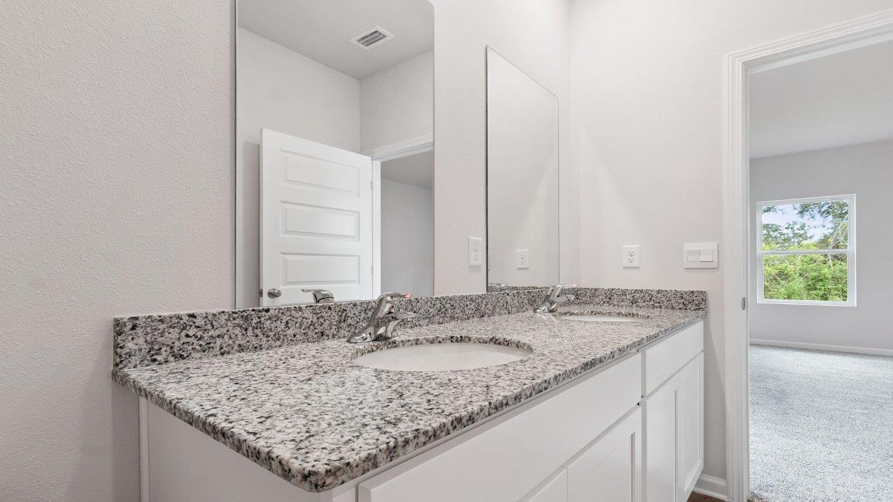 The Walker plan is a single-story, 3 bed, 2 bath layout