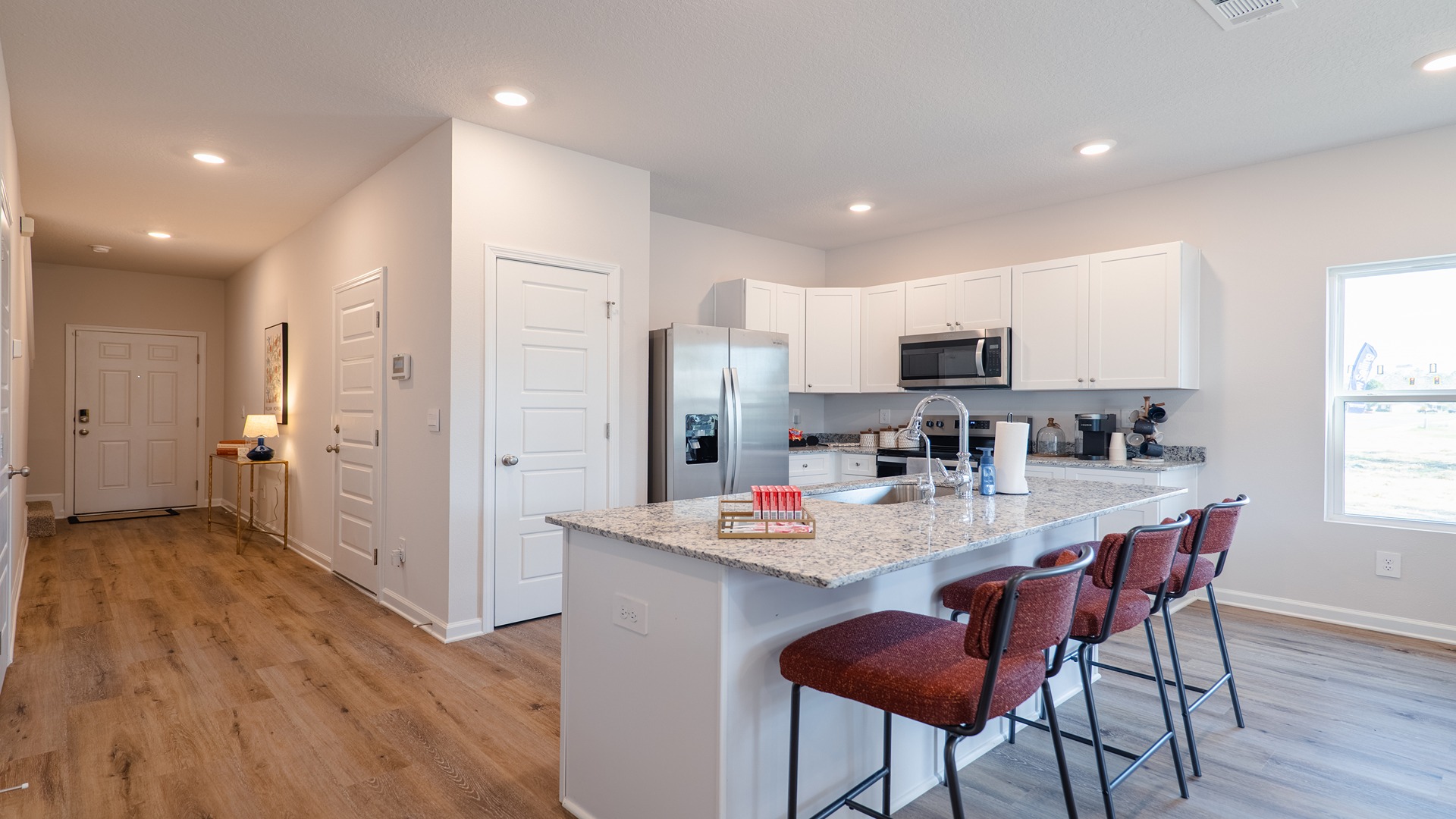 a 3-bedroom, 2 ½-bathroom end-unit townhome with an attached garage