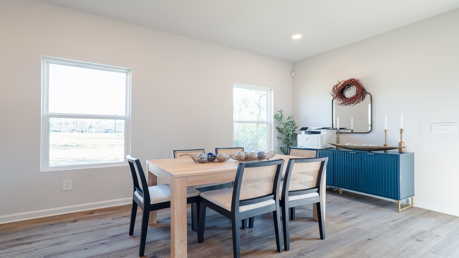 a 3-bedroom, 2 ½-bathroom end-unit townhome with an attached garage