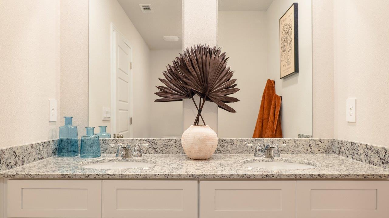 a 3-bedroom, 2 ½-bathroom end-unit townhome with an attached garage