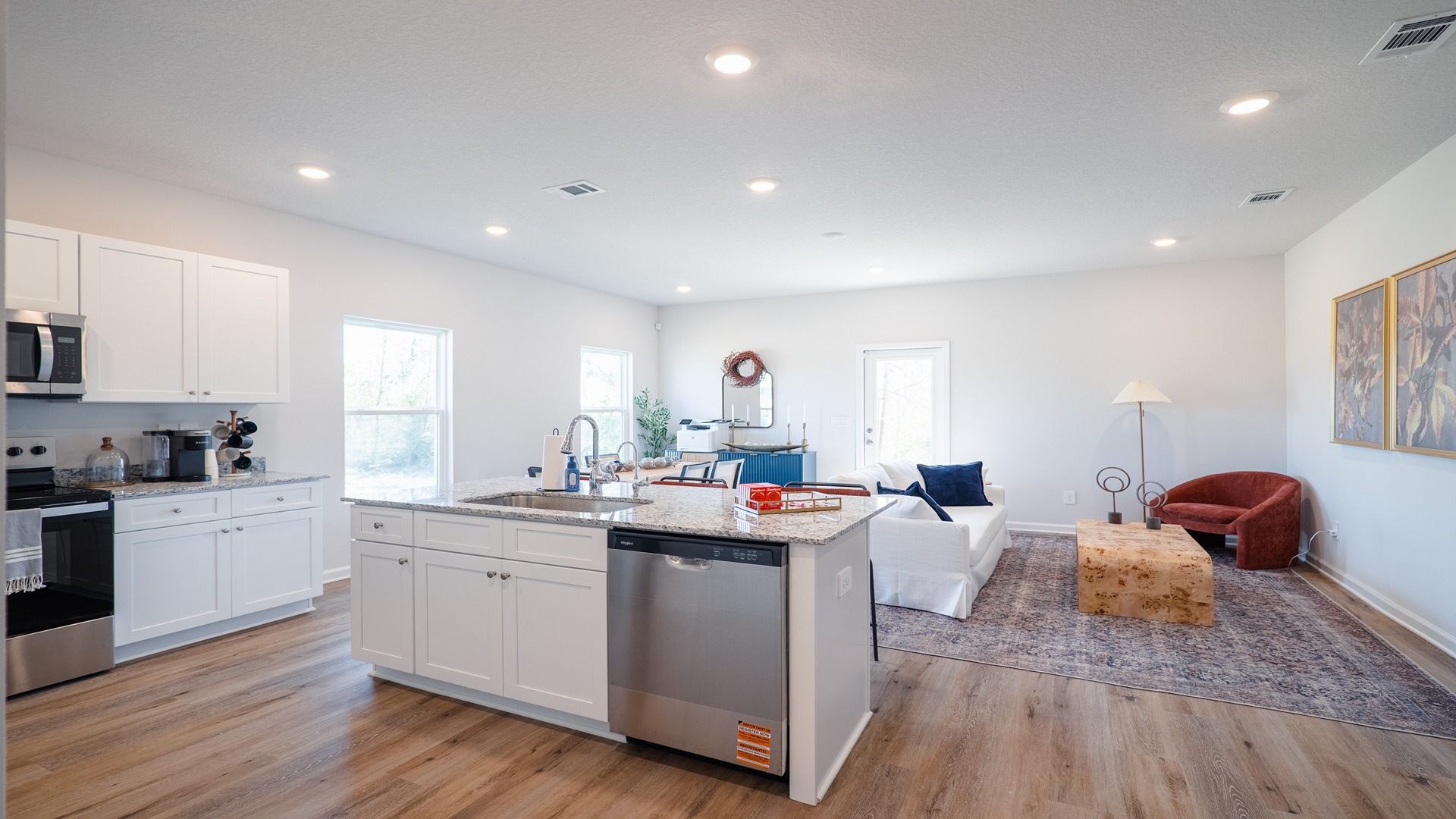 This modern and spacious floorplan features a 3-bedroom, 2 ½-bathroom end-unit townhome