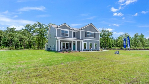 Model home on a large corner lot