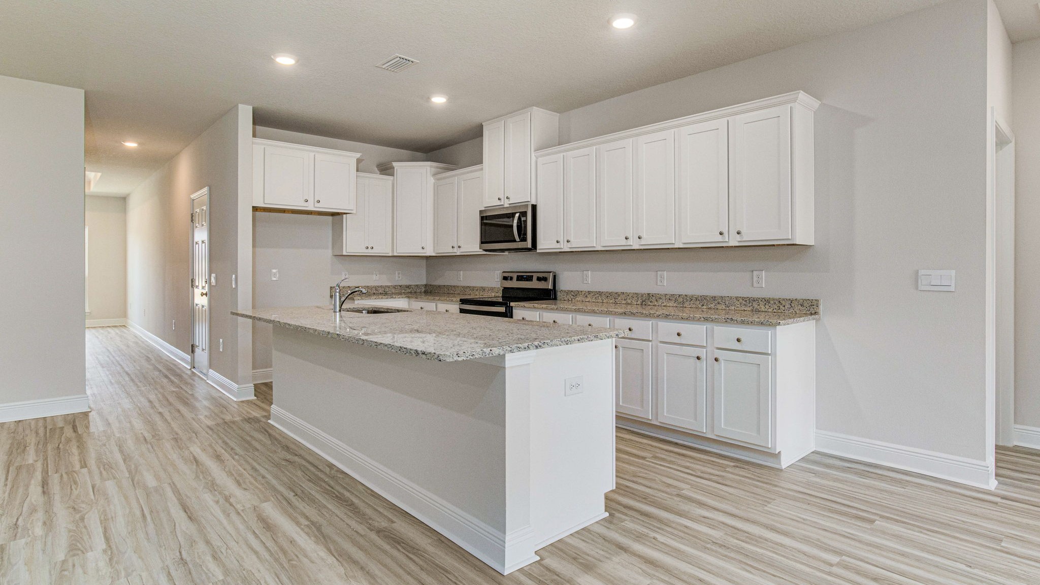 Kitchen with white counters