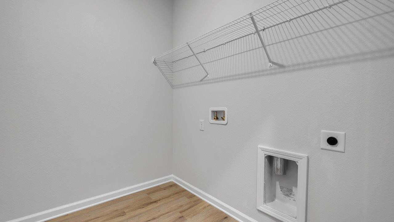 This floorplan offers ample space and functionality with five bedrooms, three bathrooms