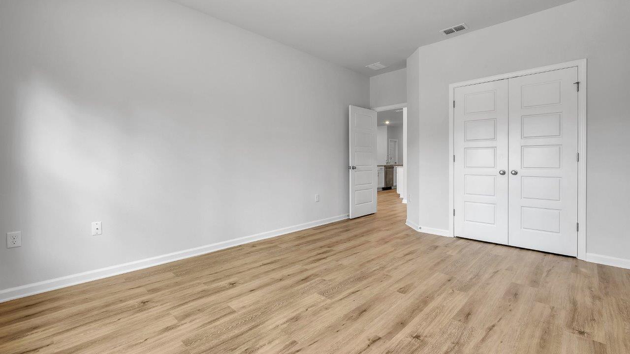 This floorplan offers ample space and functionality with five bedrooms, three bathrooms