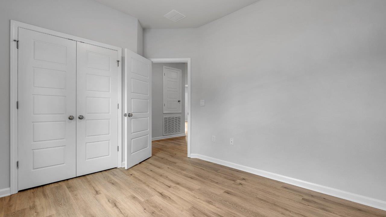 This floorplan offers ample space and functionality with five bedrooms, three bathrooms