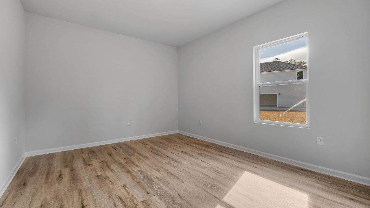 This floorplan offers ample space and functionality with five bedrooms, three bathrooms