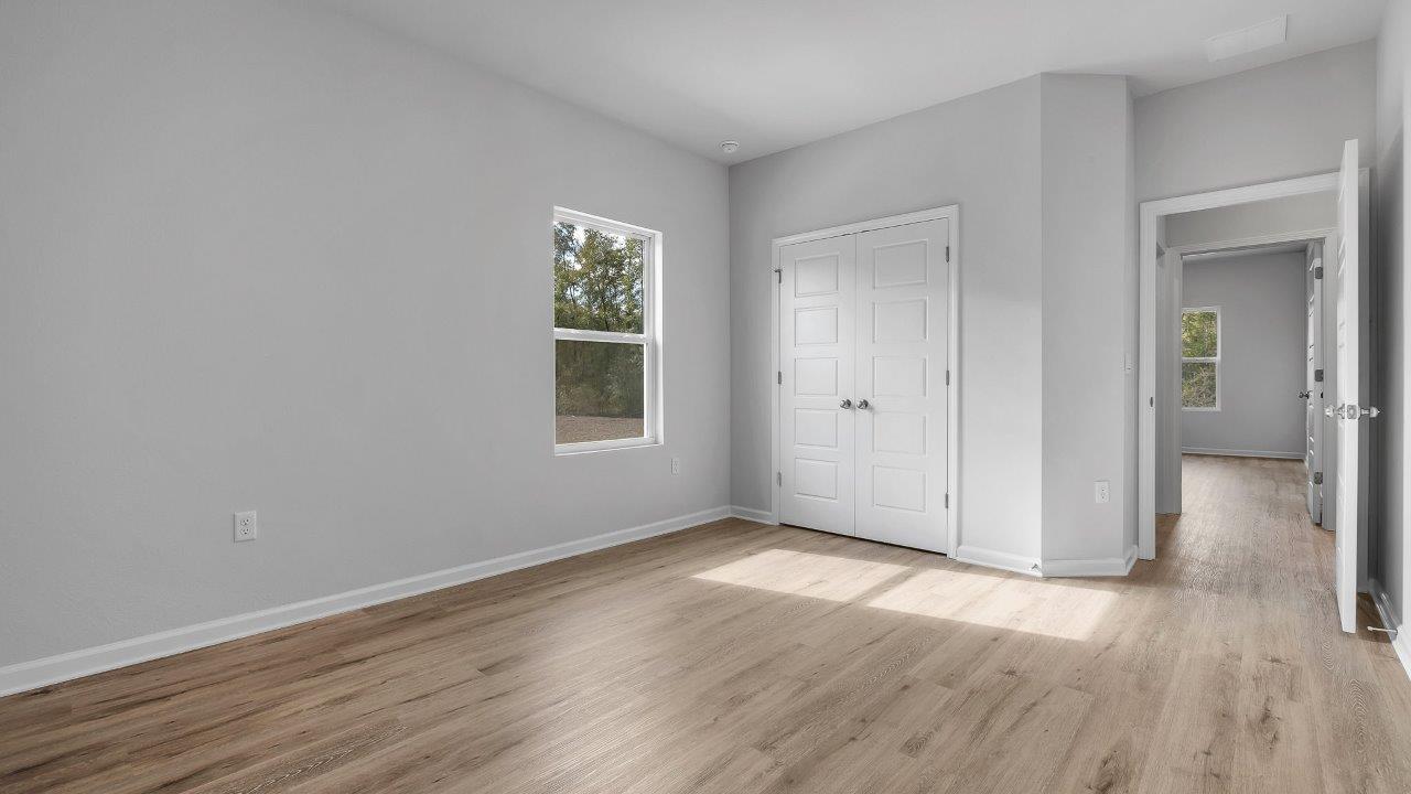 This floorplan offers ample space and functionality with five bedrooms, three bathrooms