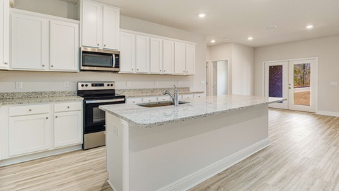 This floorplan offers ample space and functionality with five bedrooms, three bathrooms