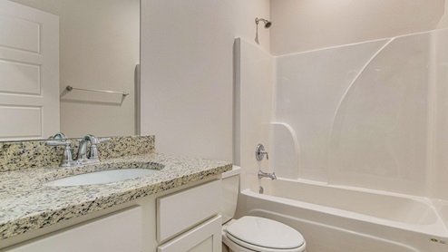 This floorplan offers ample space and functionality with five bedrooms, three bathrooms