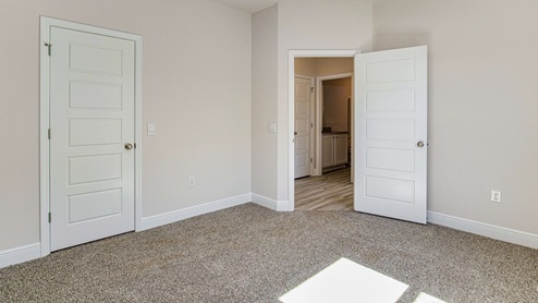 This floorplan offers ample space and functionality with five bedrooms, three bathrooms