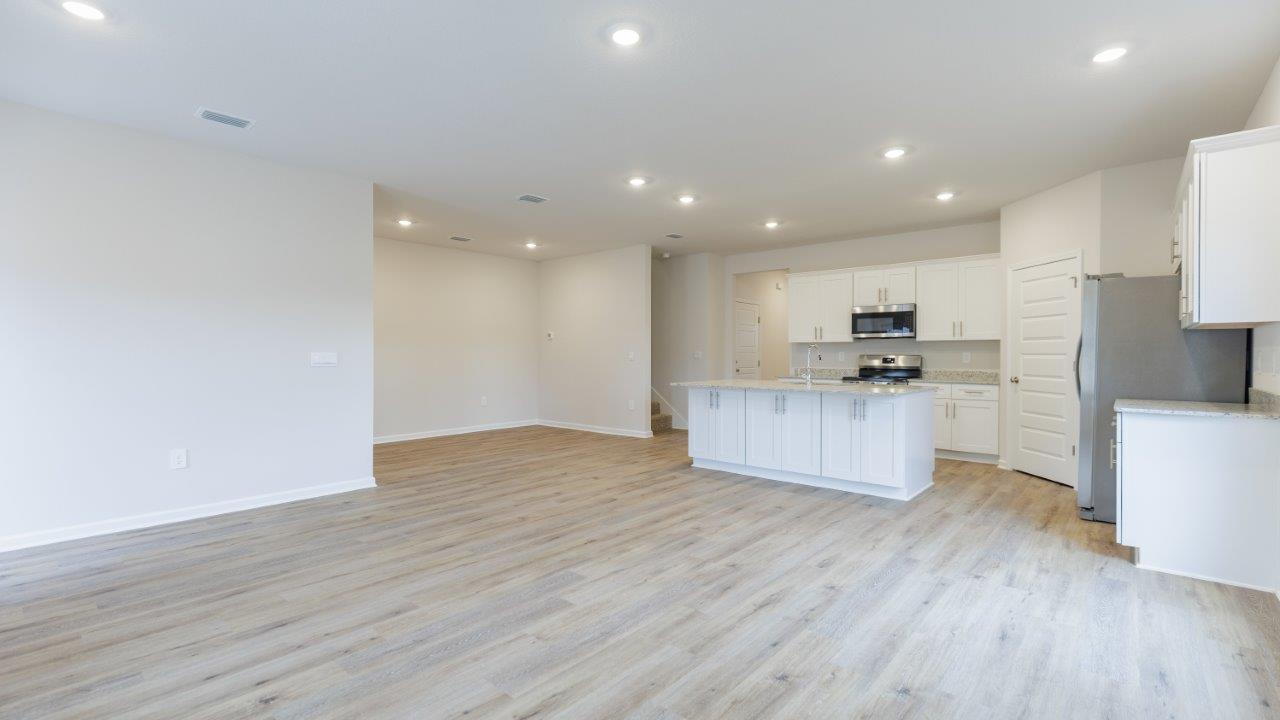 This floorplan features 4 bedrooms, 3 bathrooms, and approximately 2,458 square feet.