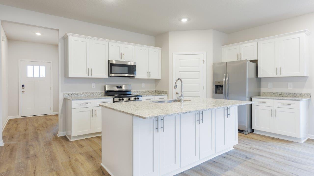 This floorplan features 4 bedrooms, 3 bathrooms, and approximately 2,458 square feet.