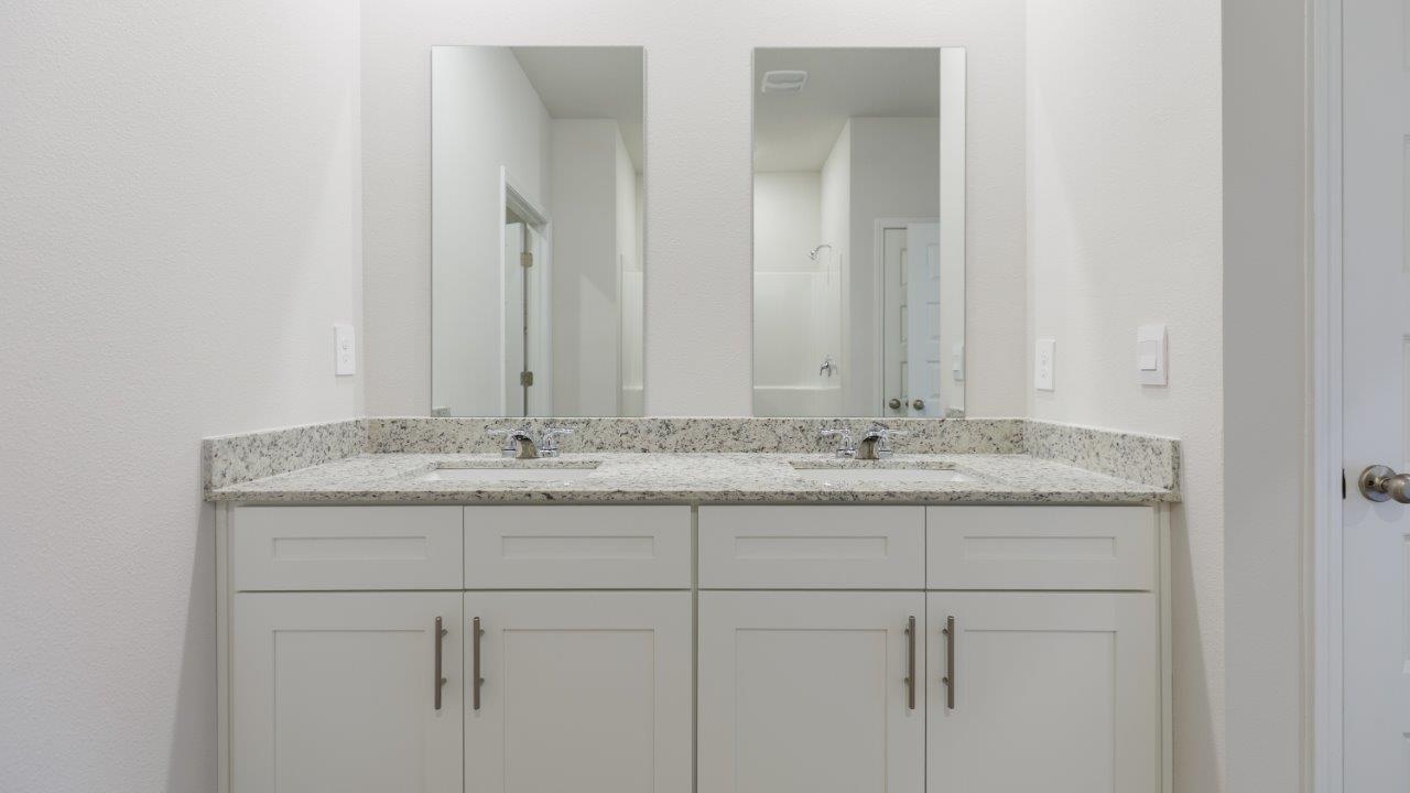 This floorplan features 4 bedrooms, 3 bathrooms, and approximately 2,458 square feet