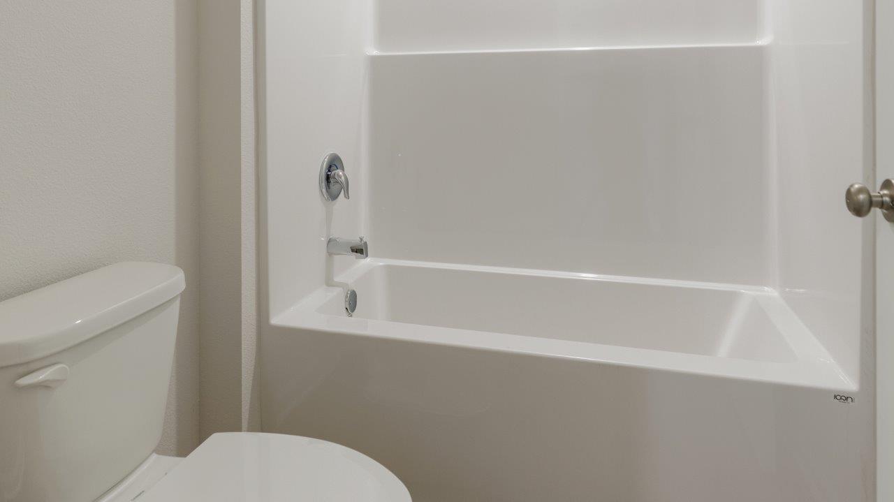 This floorplan features 4 bedrooms, 3 bathrooms, and approximately 2,458 square feet