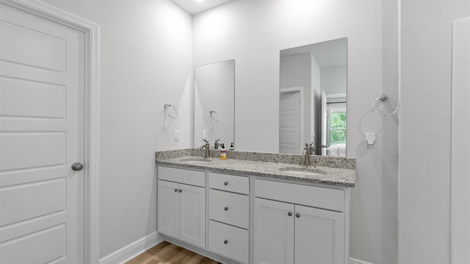 This one-level plan provides a spacious, 4-bedroom, 2 bath design in 1,799 square feet