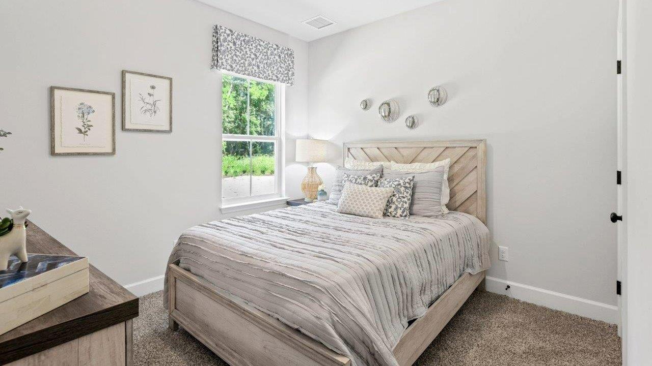 This one-level plan provides a spacious, 4-bedroom, 2 bath design in 1,799 square feet