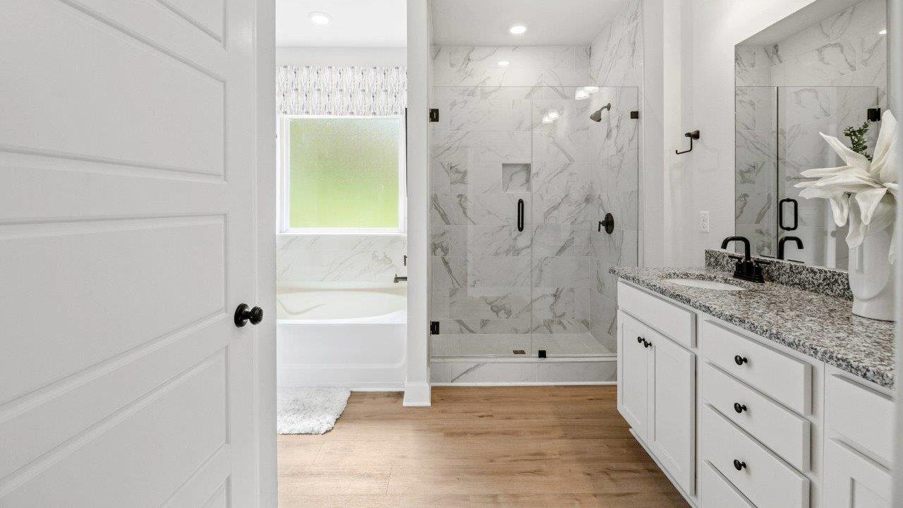 This one-level plan provides a spacious, 4-bedroom, 2 bath design in 1,799 square feet