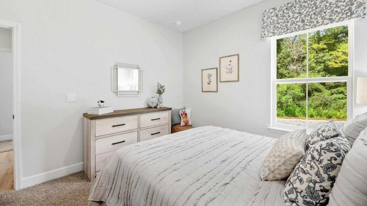 This one-level plan provides a spacious, 4-bedroom, 2 bath design in 1,799 square feet