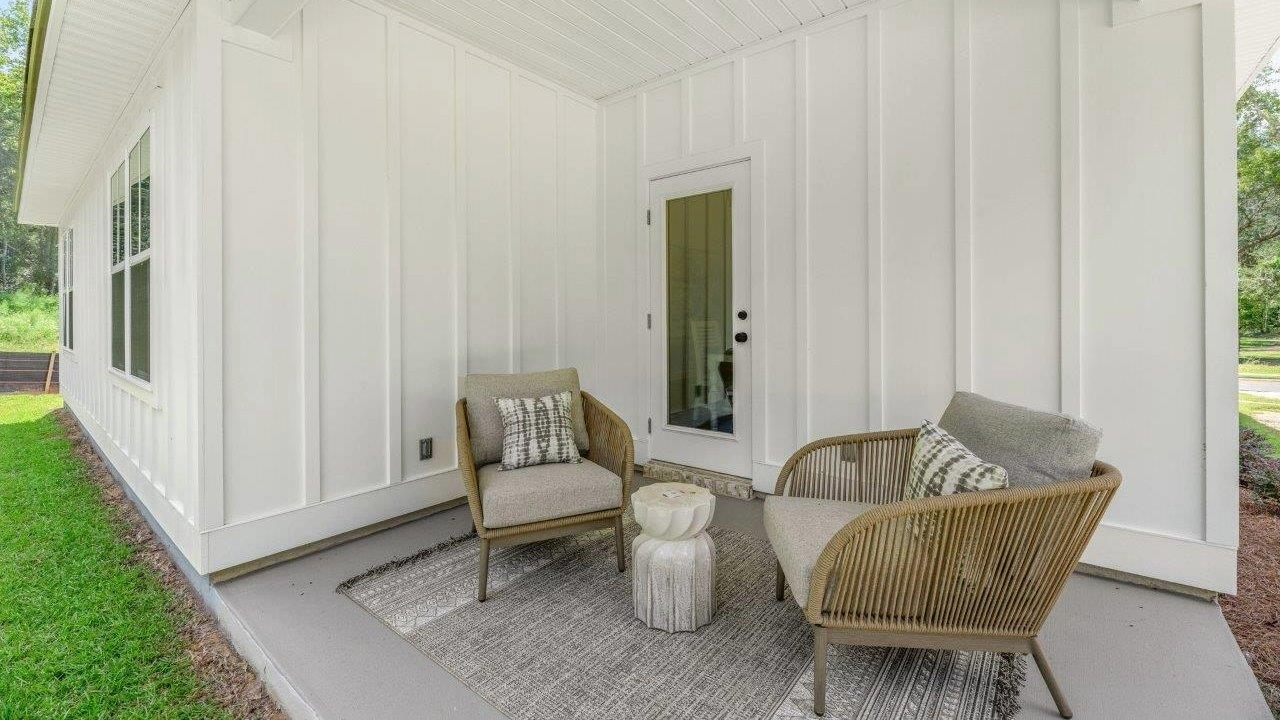 This one-level plan provides a spacious, 4-bedroom, 2 bath design in 1,799 square feet