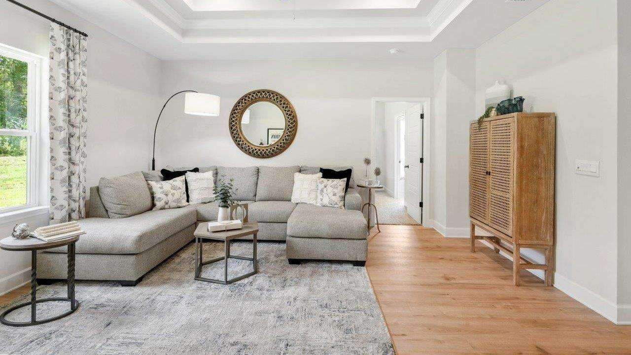 This one-level plan provides a spacious, 4-bedroom, 2 bath design in 1,799 square feet