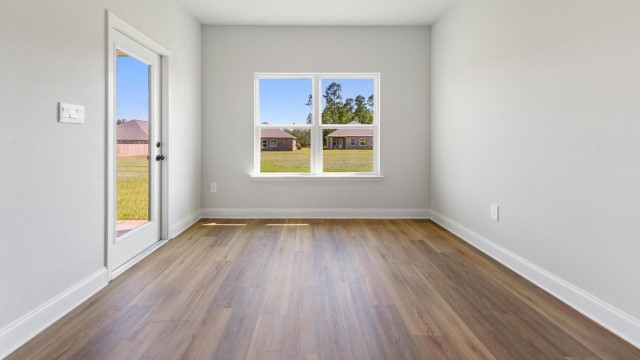 breakfast nook with door leading to patio