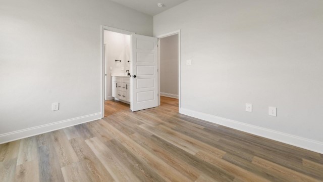 third bedroom with connecting bath