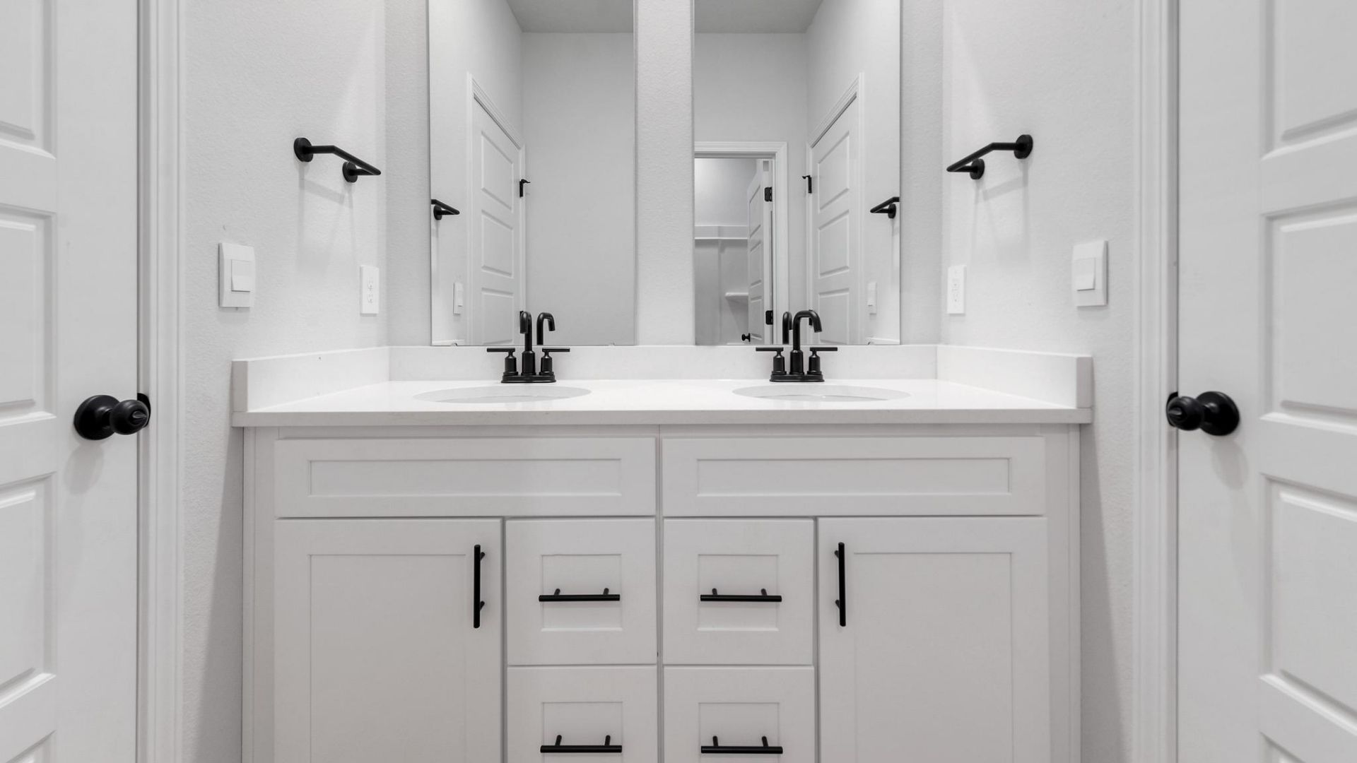 second and third bedroom bathroom with dual vanities
