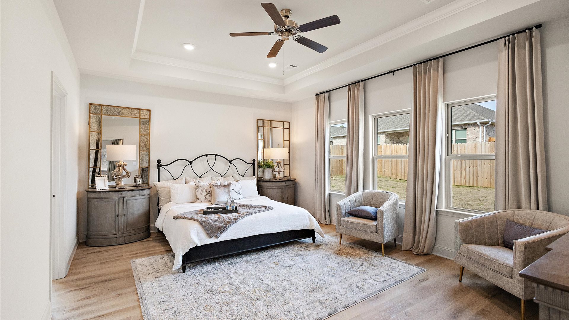 Primary bedroom designed with style and comfort in mind, flows to your spa-inspired ensuite and walk-in closet