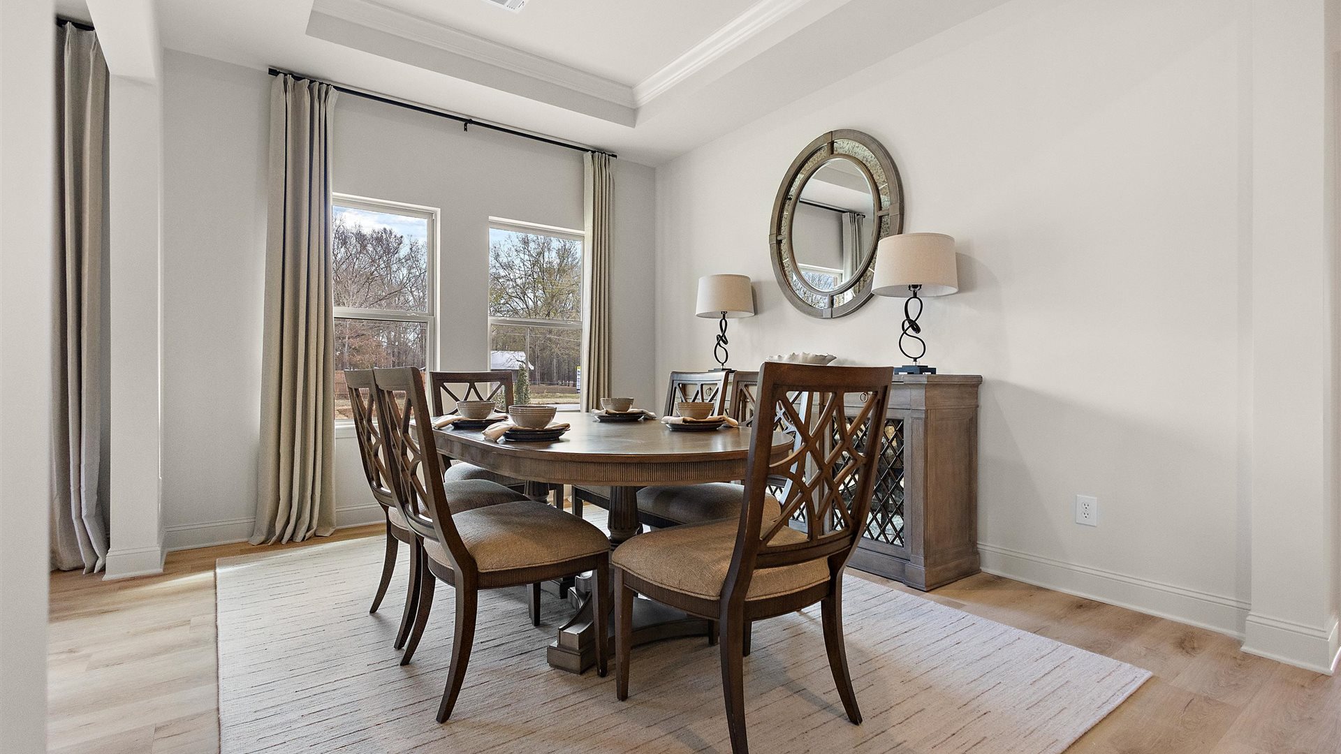 Dining room with natural light, open access and seamless flow continuing to living area access