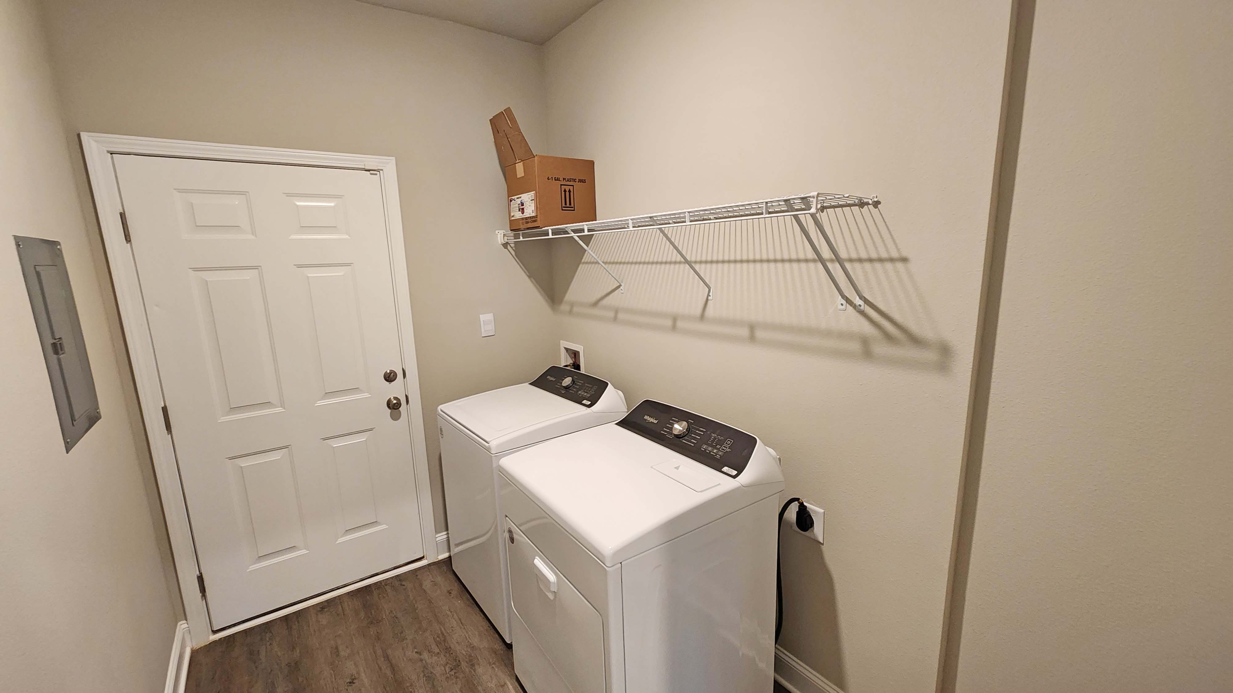 laundry room with wire shelving
