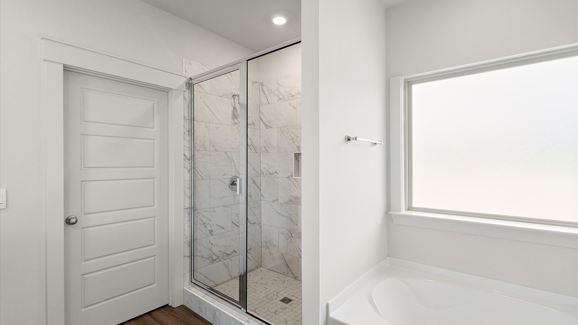 interior bathroom with walk in shower and a bathtub