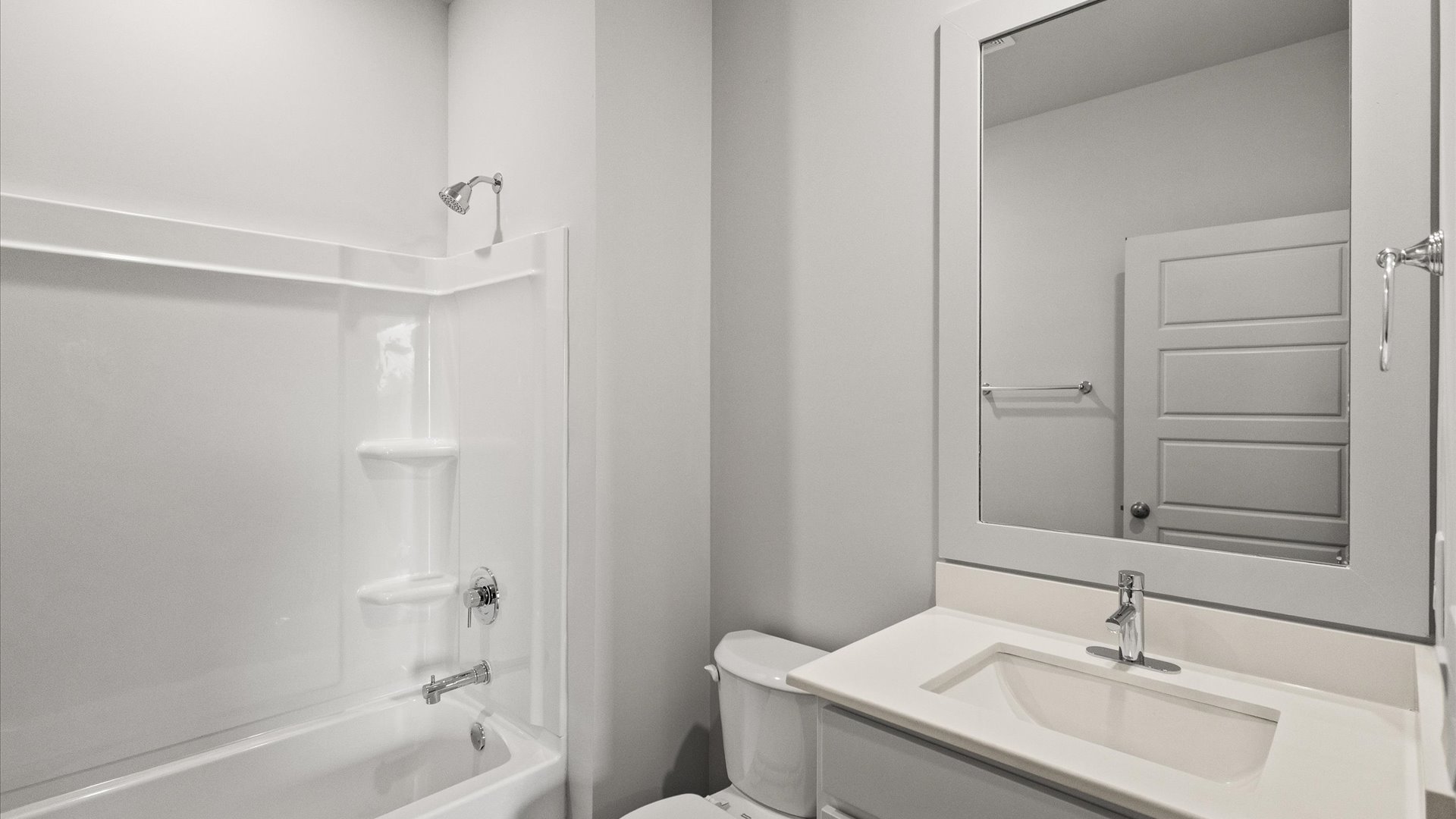 interior bathroom with sink and full size shower