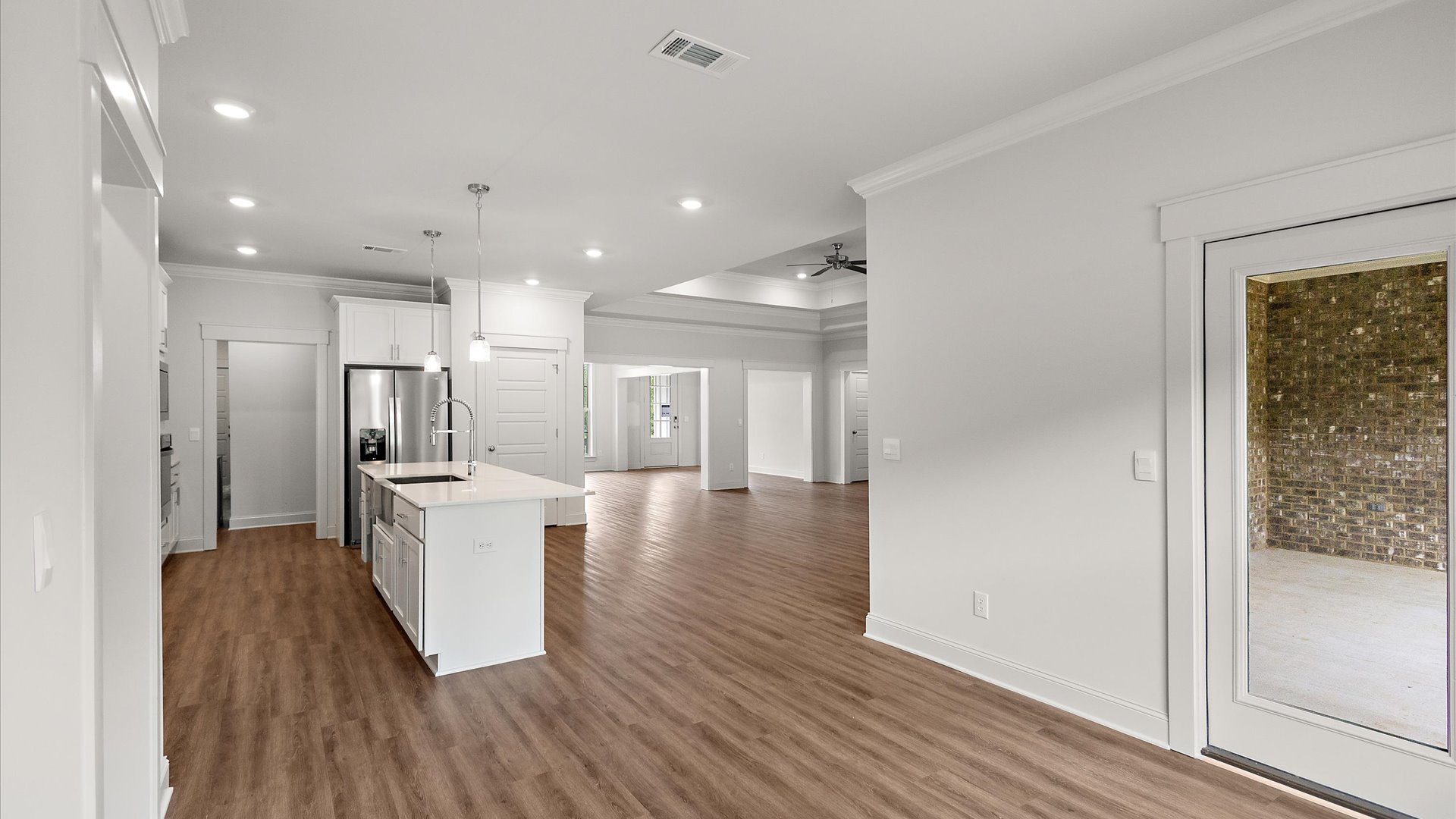 interior breakfast nook open to kitchen