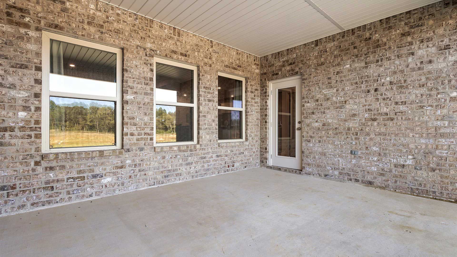 Patio opens to greenspace