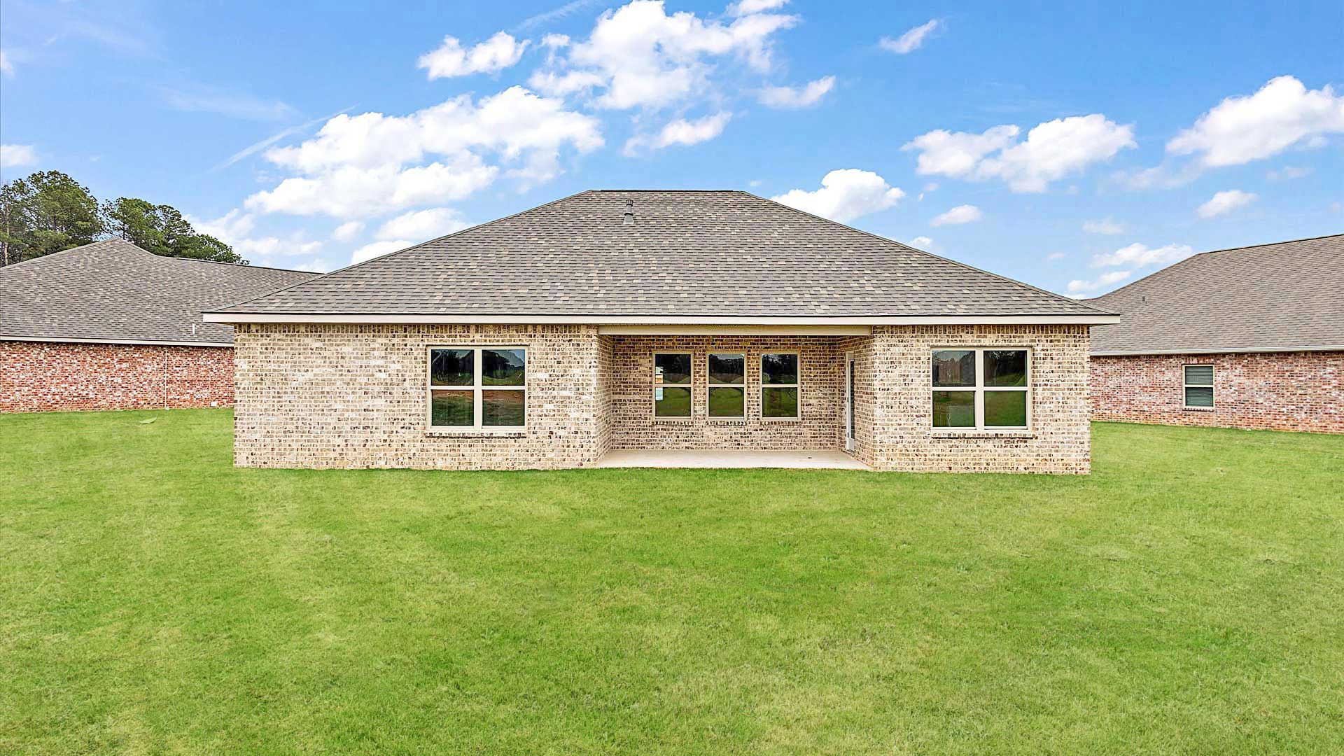 Patio opens up to greenspace