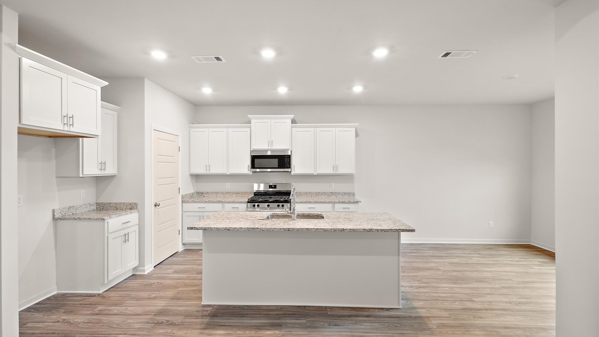 Kitchen with granite countertops and stainless steel appliances