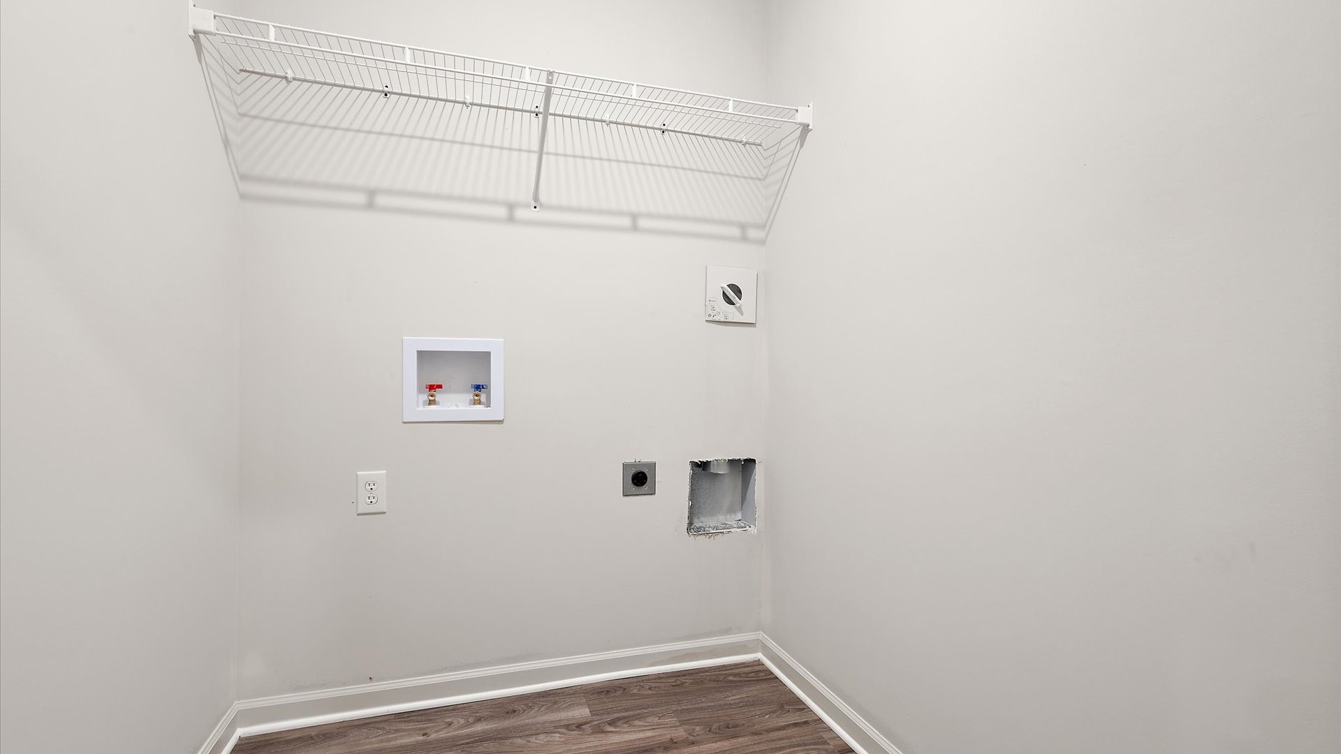 Laundry room with wire shelving