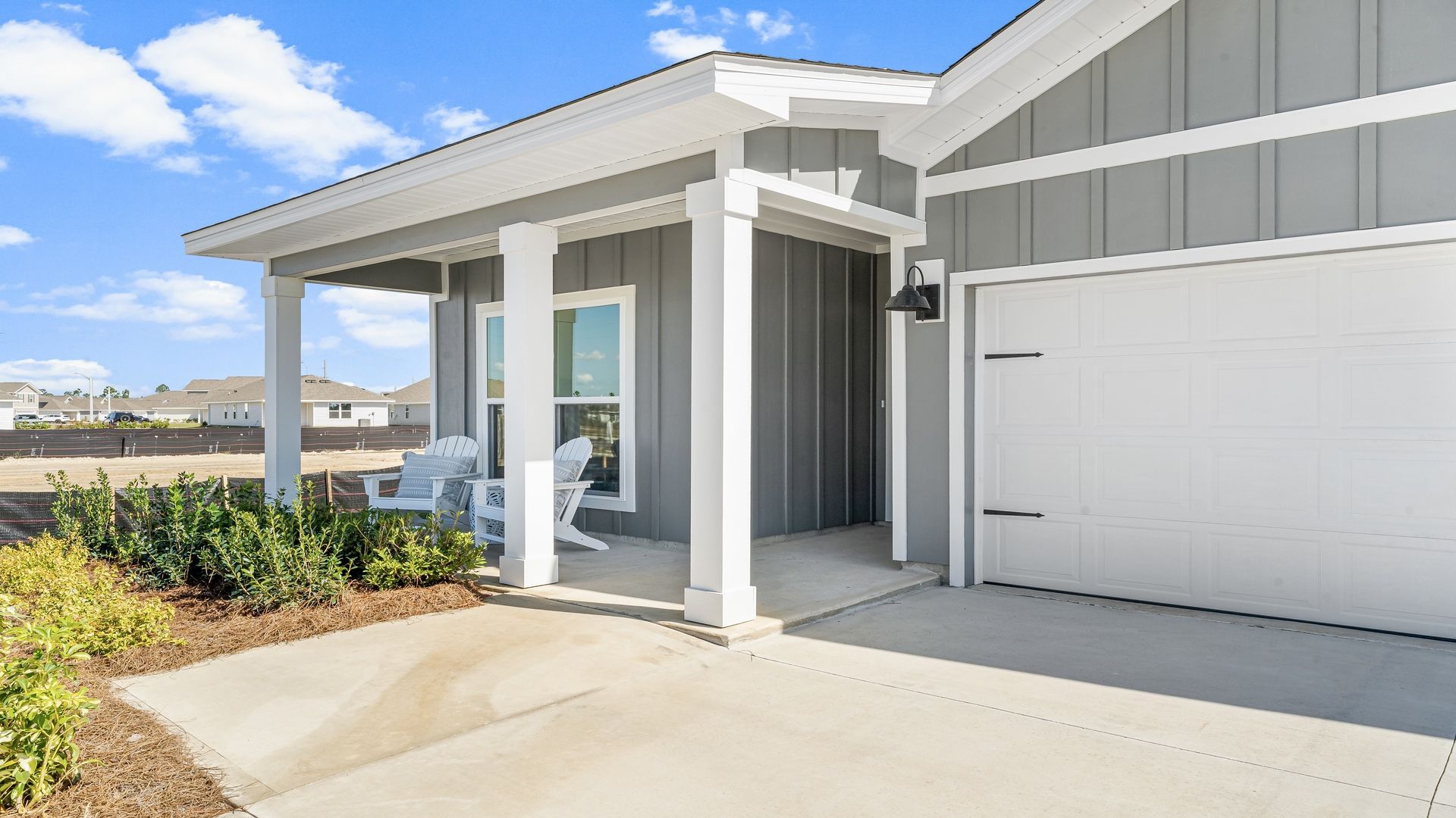 The Madison single-story home with covered porch. New home in Pearl, MS.